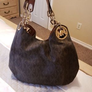 Authentic used MK FULTON PURSE